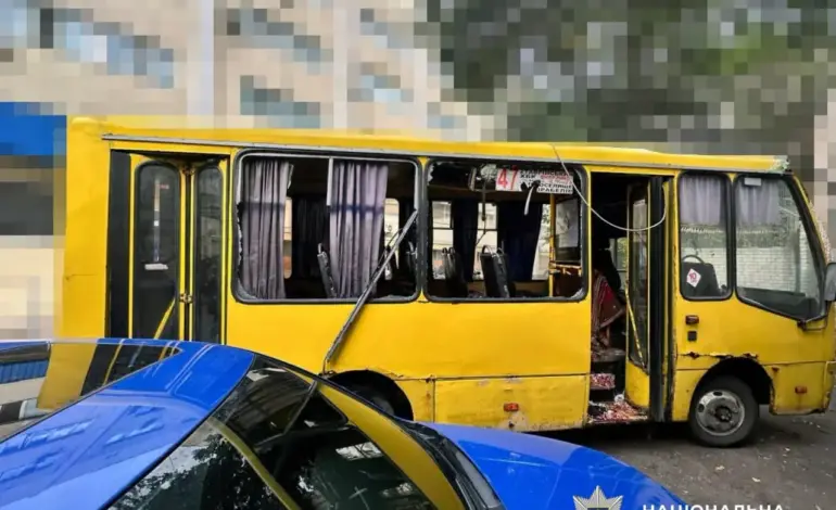 Damaged civilian minibus in Kherson after a Russian drone attack.