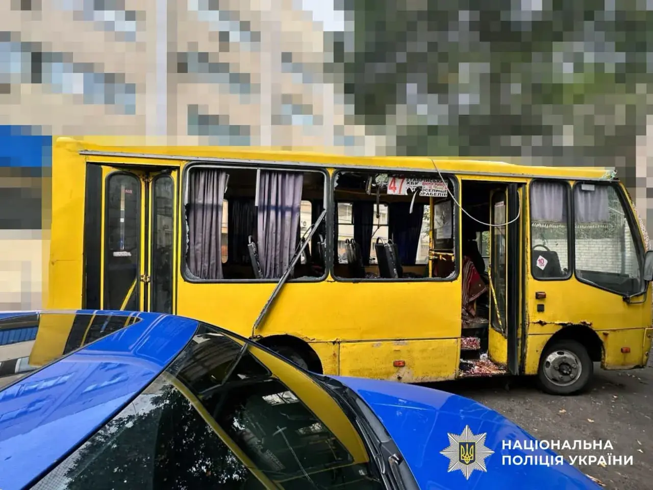 Damaged civilian minibus in Kherson after a Russian drone attack.