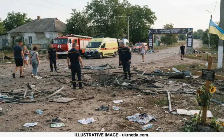 Emergency workers inspect the aftermath of a Russian missile strike on a memorial running event in Kharkiv region